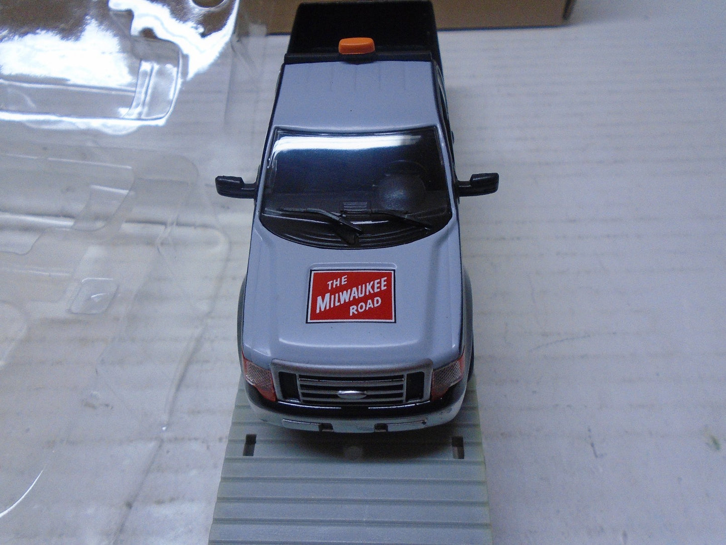 Menards O Scale Flatcar with Milwaukee Road F150 Maintenance Truck