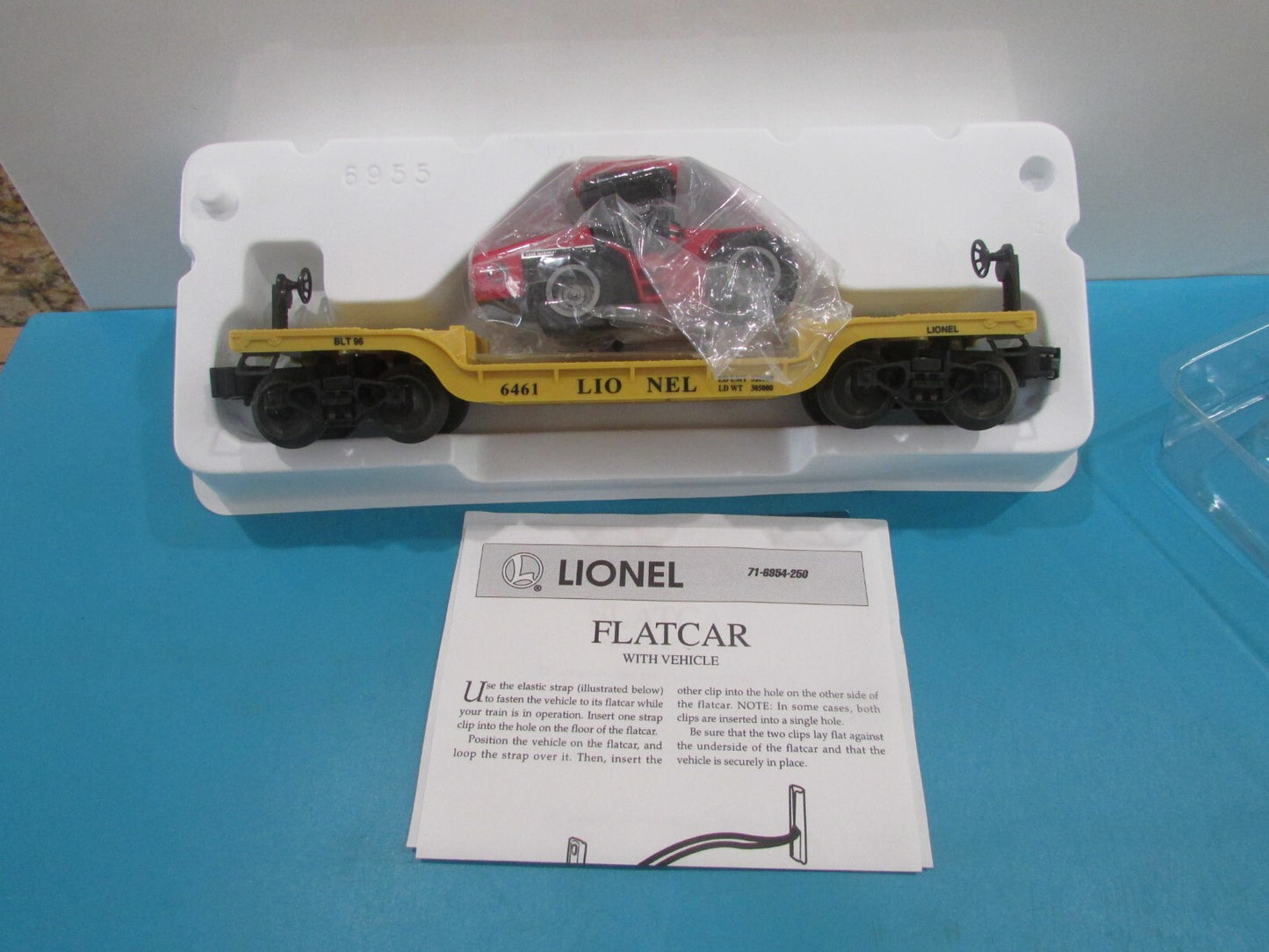 O SCALE Lionel 6-16957 Depressed-Center Flatcar w/ERTL Case 4WD Loader Lot#1704