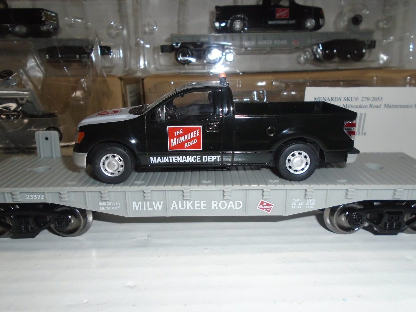 Menards  O Scale (4) Flatcar with Milwaukee Road F150 Maintenance Truck