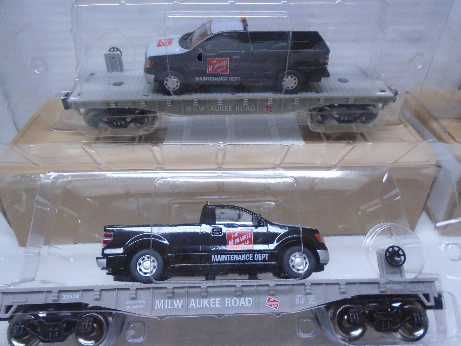 Menards  O Scale (4) Flatcar with Milwaukee Road F150 Maintenance Truck