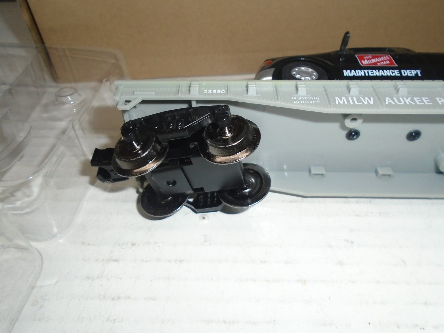 Menards  O Scale Flatcar with Milwaukee Road F150 Maintenance Truck