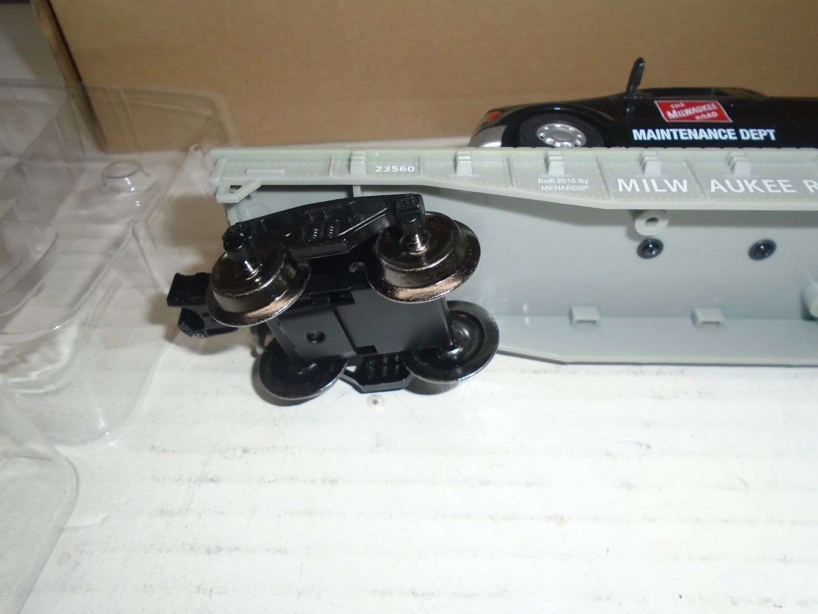 Menards  O Scale Flatcar with Milwaukee Road F150 Maintenance Truck